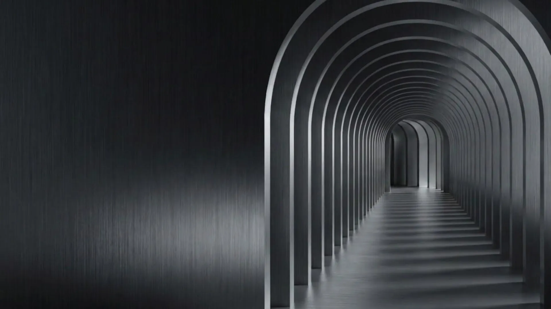 An endless colonnade of arches receding into the distance